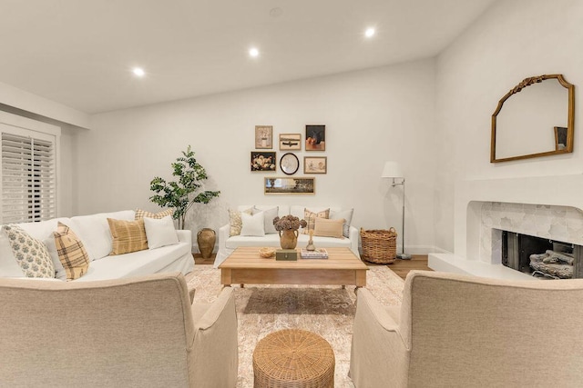 living room featuring a fireplace