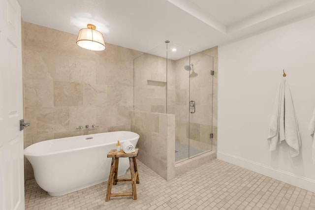 bathroom featuring tile patterned floors and plus walk in shower