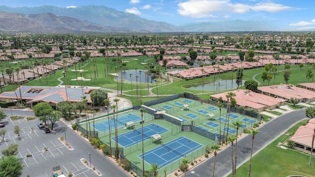 birds eye view of property featuring a mountain view