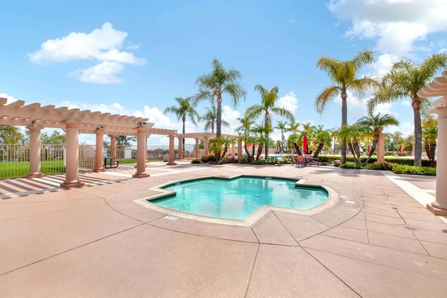 view of pool with a pergola and a patio