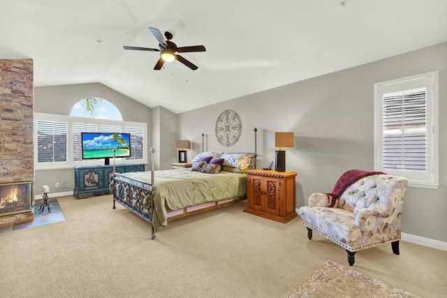 carpeted bedroom with lofted ceiling and ceiling fan