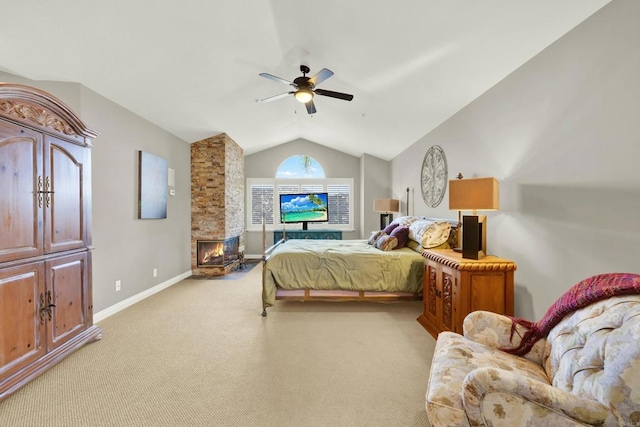 carpeted bedroom with vaulted ceiling and ceiling fan