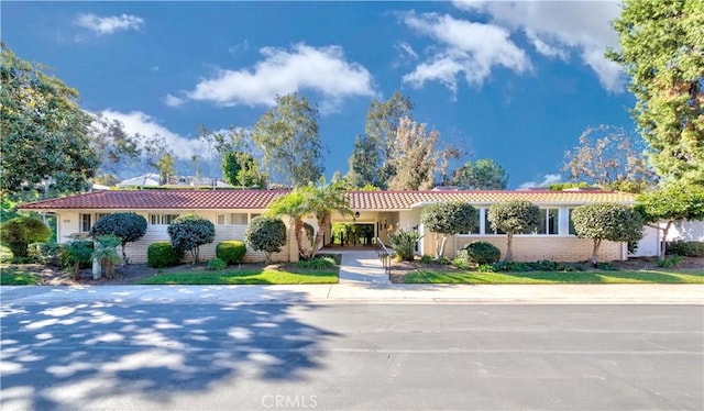 ranch-style home with a carport