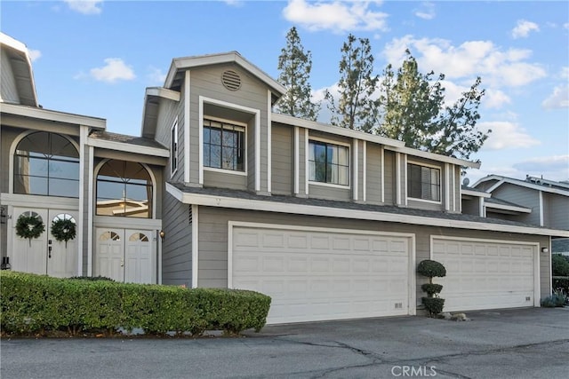 view of property featuring a garage