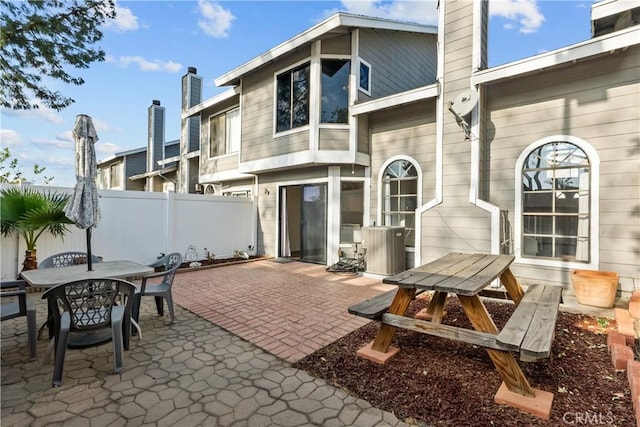 rear view of house with a patio