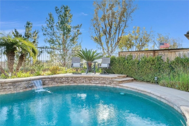 view of pool featuring pool water feature