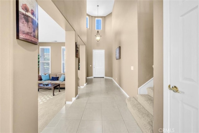 hallway with light tile patterned flooring