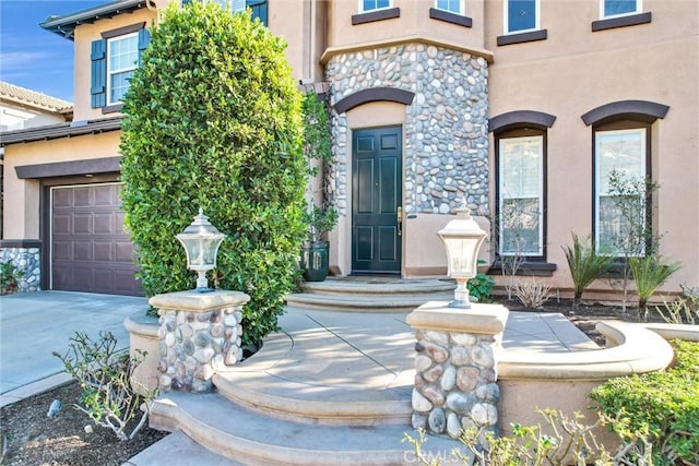 entrance to property featuring a garage