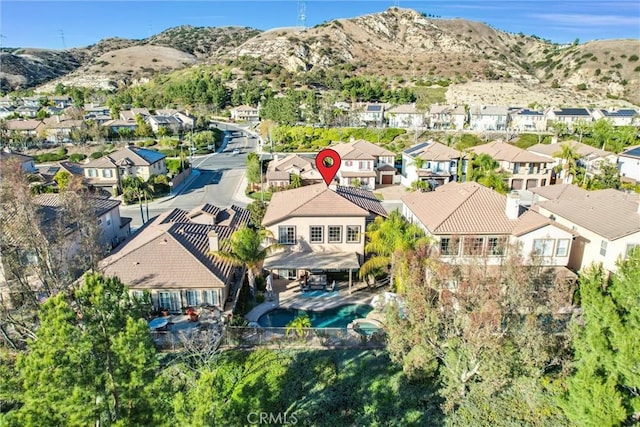 bird's eye view with a mountain view