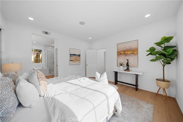 bedroom featuring light hardwood / wood-style floors