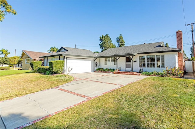 ranch-style home with a front lawn and a garage