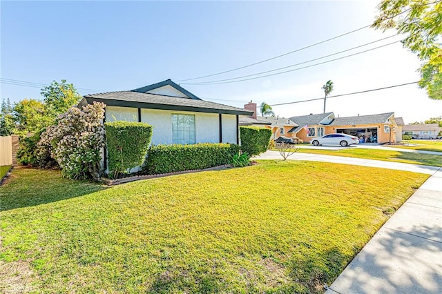 view of front facade with a front yard