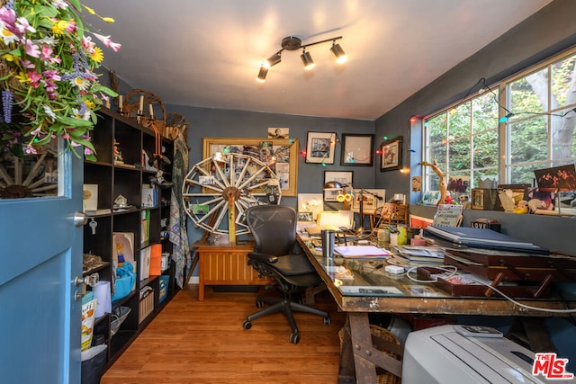 office featuring hardwood / wood-style floors