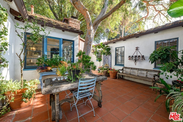 view of patio featuring exterior bar