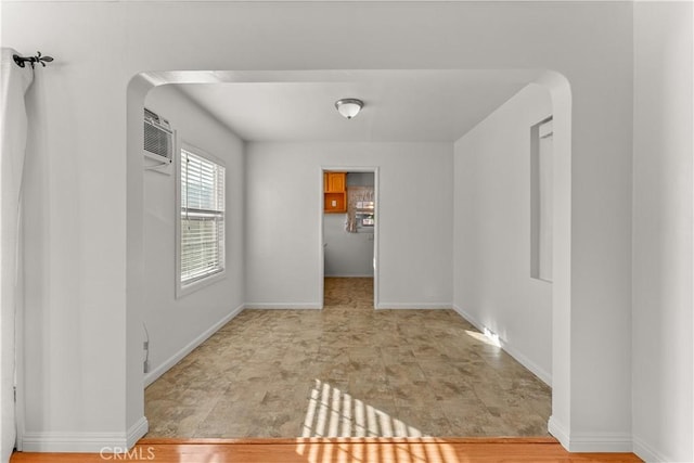 hallway featuring a wall mounted air conditioner