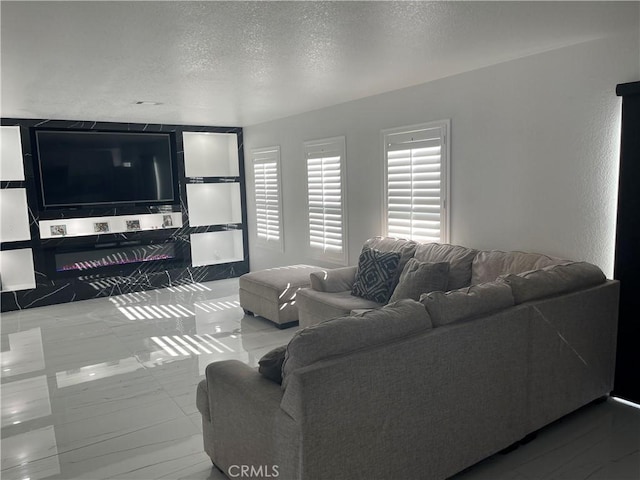 living room featuring a textured ceiling