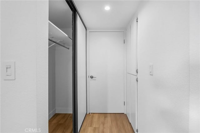 walk in closet featuring light wood-type flooring