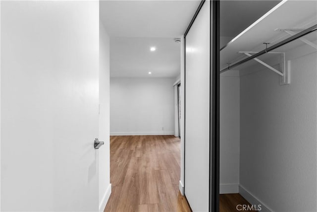 hall featuring light wood-type flooring