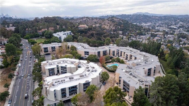 bird's eye view with a mountain view