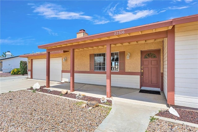 entrance to property with a garage