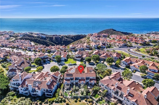 bird's eye view featuring a residential view and a water view