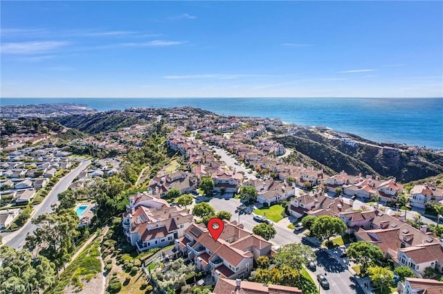 bird's eye view featuring a residential view and a water view