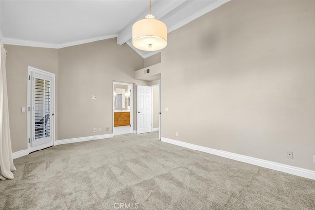 unfurnished bedroom with baseboards, beam ceiling, carpet flooring, ensuite bathroom, and high vaulted ceiling