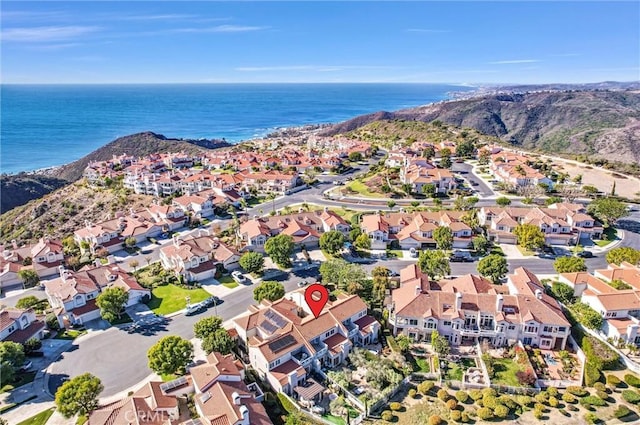 bird's eye view featuring a residential view and a water view