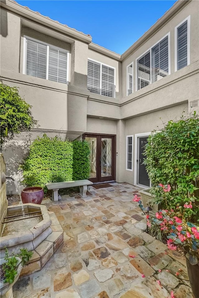 view of patio / terrace featuring french doors