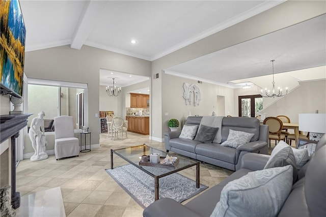 living room with plenty of natural light, baseboards, and a chandelier