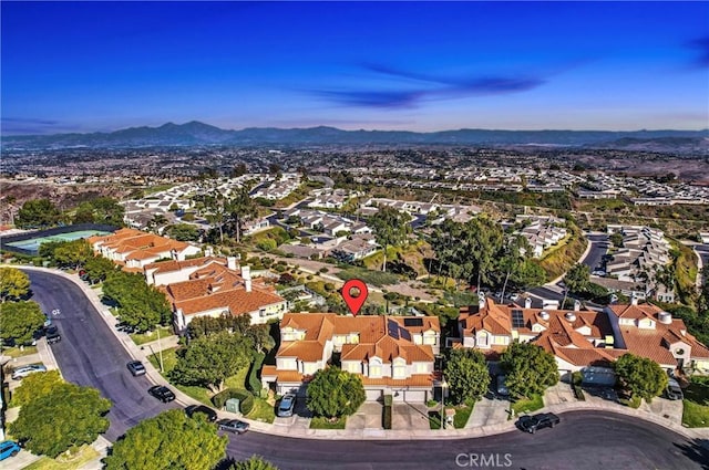 aerial view with a mountain view and a residential view