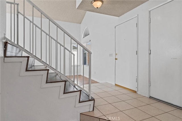 entrance foyer with light tile patterned floors