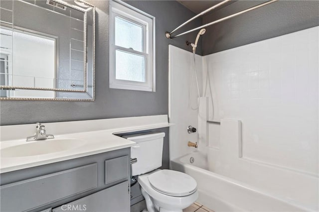 full bathroom featuring shower / tub combination, toilet, and vanity