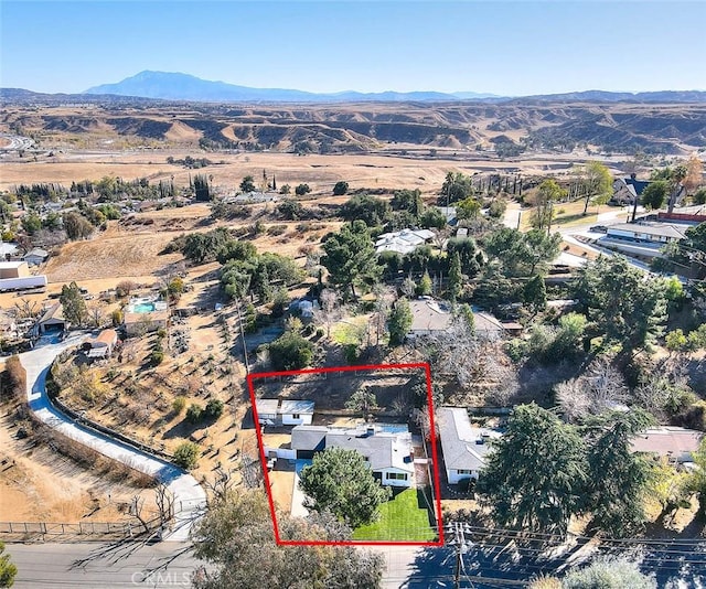 aerial view featuring a mountain view