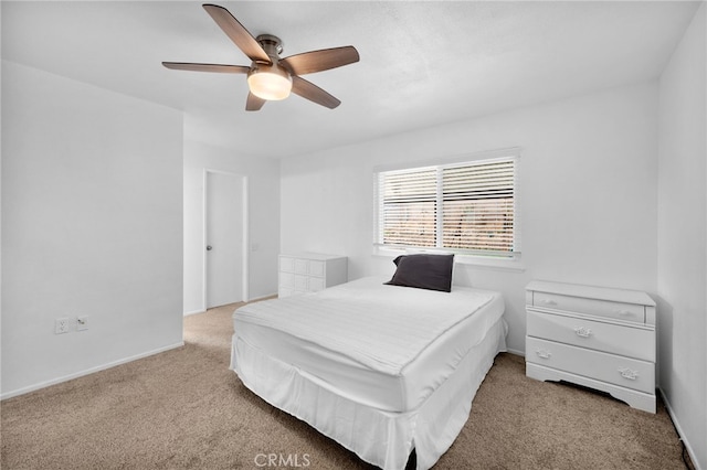 bedroom with ceiling fan and carpet flooring