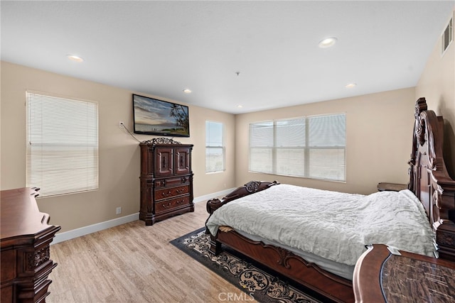 bedroom with light wood-type flooring