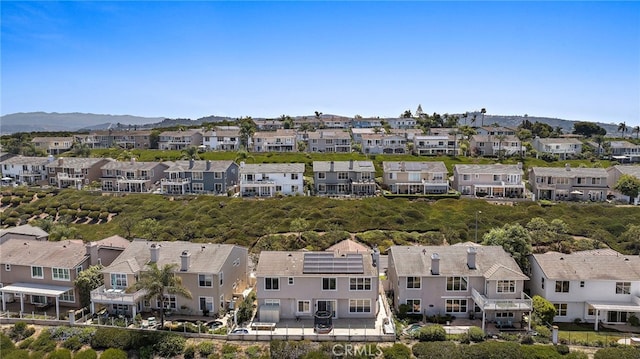 2438 Calle Aquamarina, San Clemente, CA 92673 - aerial perspective of suburban area featuring a mountainous background