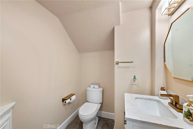 2438 Calle Aquamarina, San Clemente, CA 92673 - half bathroom with vanity, toilet, lofted ceiling, a textured ceiling, and baseboards