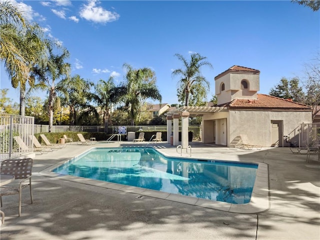 view of pool with a patio area and a pergola