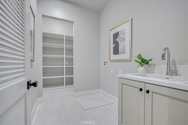 interior space featuring a closet and vanity