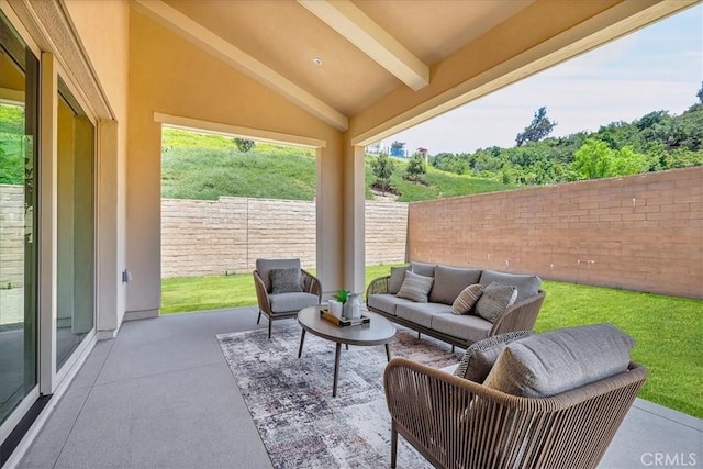 view of patio featuring a fenced backyard and an outdoor living space