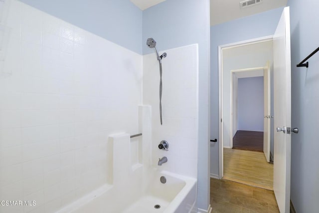 bathroom with shower / tub combination