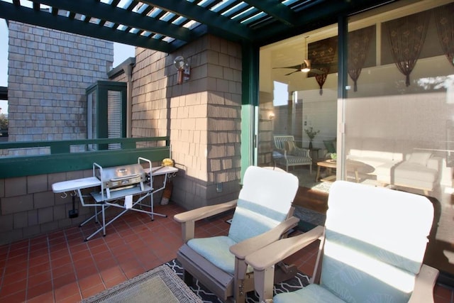 view of patio with a grill and a pergola