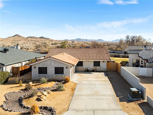 view of front of property with a mountain view