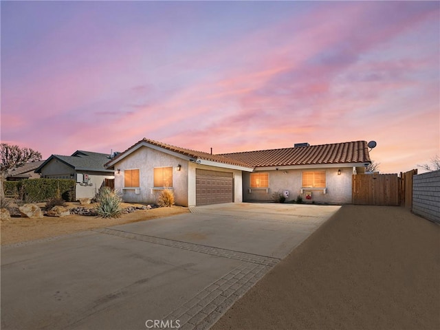 view of front of property featuring a garage