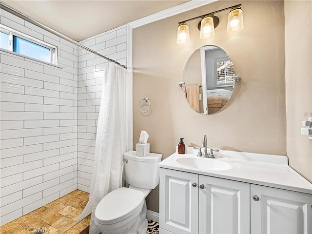 bathroom featuring vanity, toilet, and a shower with shower curtain