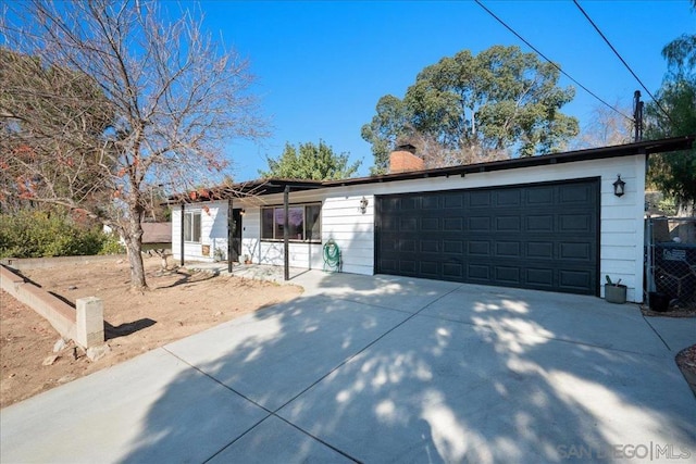 view of front of home with a garage