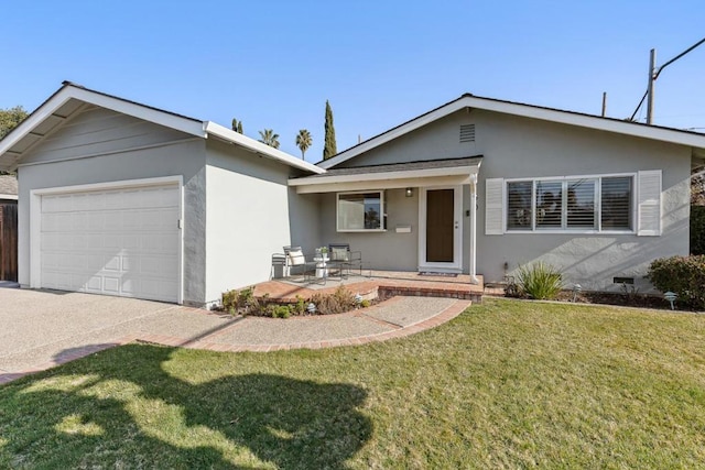 view of front of house featuring a garage, a patio, and a front lawn