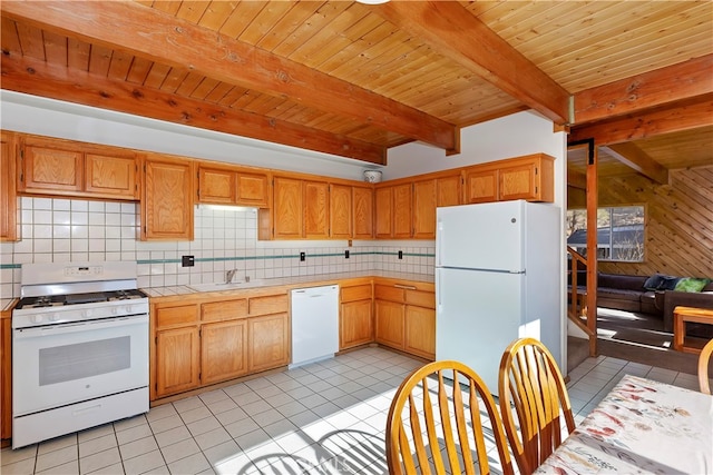 kitchen with light tile patterned floors, sink, white appliances, decorative backsplash, and beamed ceiling