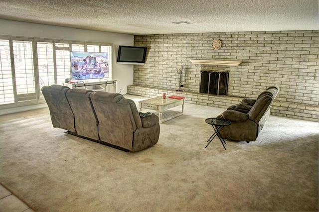 living room featuring a brick fireplace and a textured ceiling